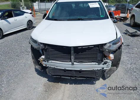 2018 Chevrolet Traverse Premier z USA, uszkodzony, nr VIN 1GNEVJKWXJJ231683